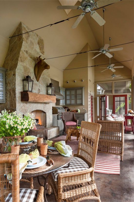 Stone in the decoration of the floor of the summer kitchen