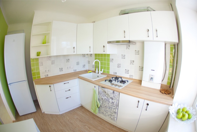 Kitchen with sloping sidewall