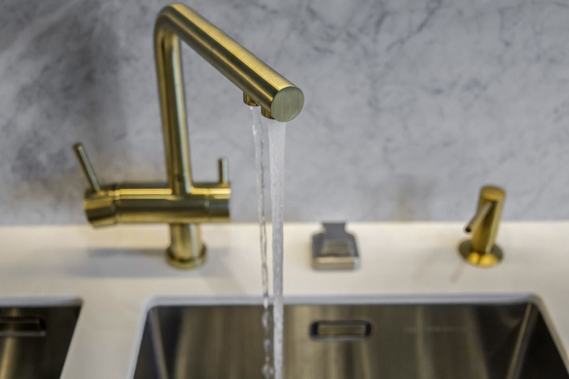 Golden mixer in the interior of the kitchen