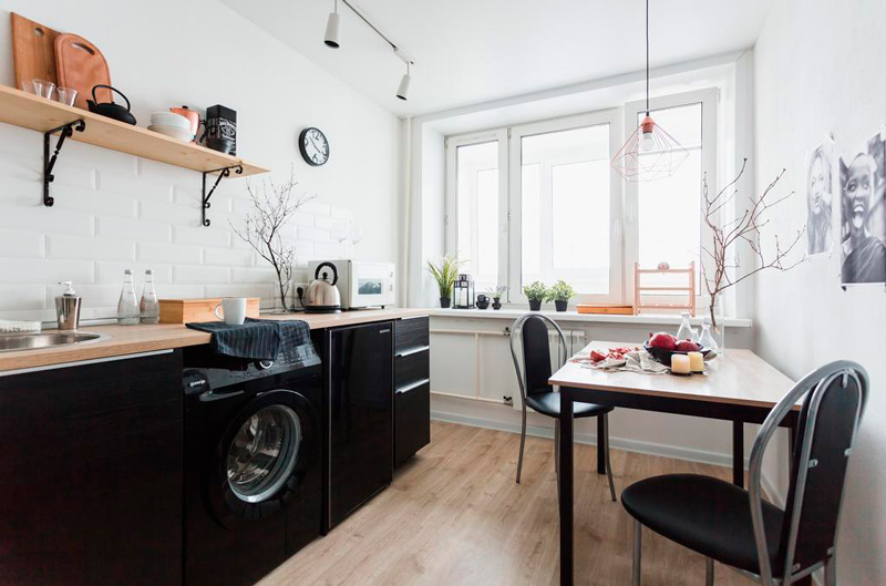 Black washing machine in the interior