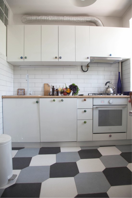 Kitchen with a niche for a refrigerator