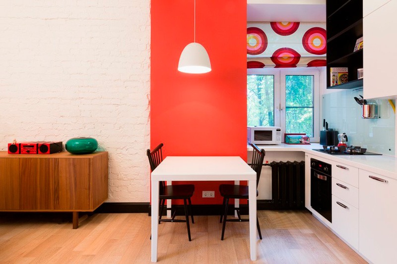 Curtains in the interior of a modern kitchen-living room