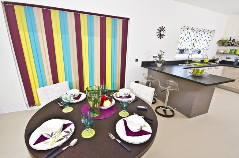 Vertical blinds in the interior of the kitchen