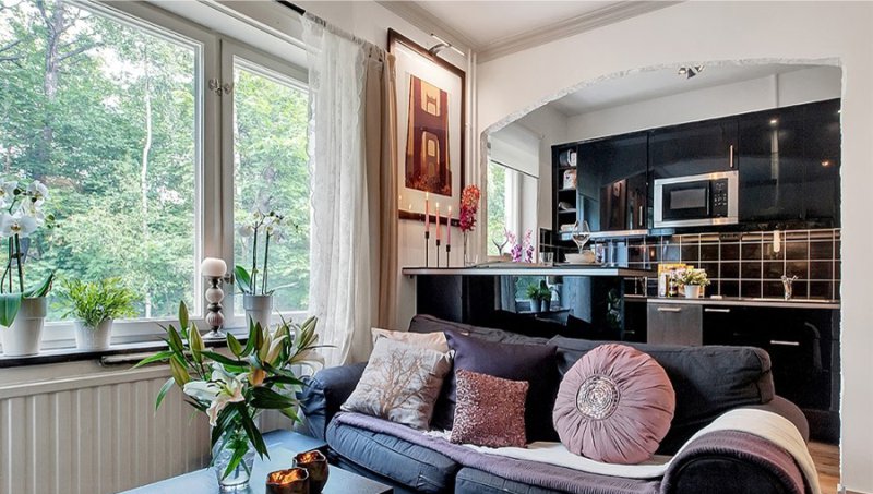 Arch in the kitchen in the interior of a studio apartment