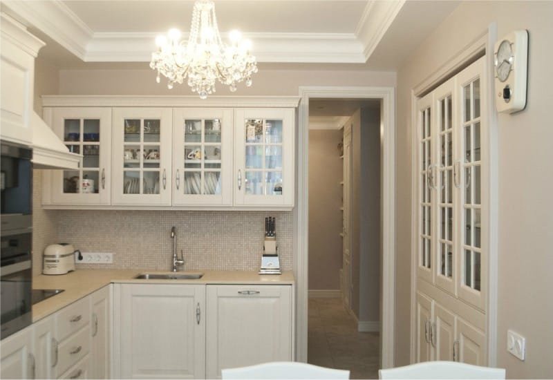 Small classic kitchen in beige tones