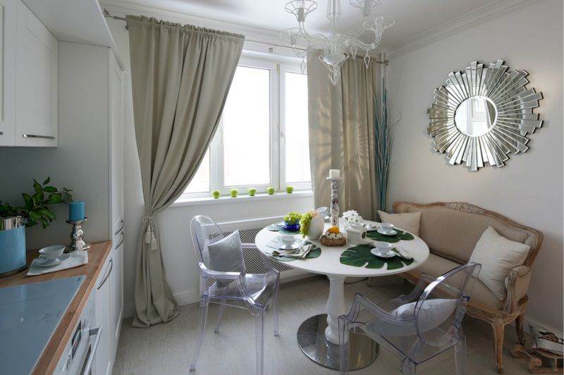 Transparent chairs in the neo-classic interior of the kitchen