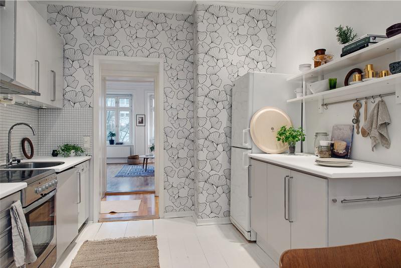 Modern kitchen interior with wallpaper.