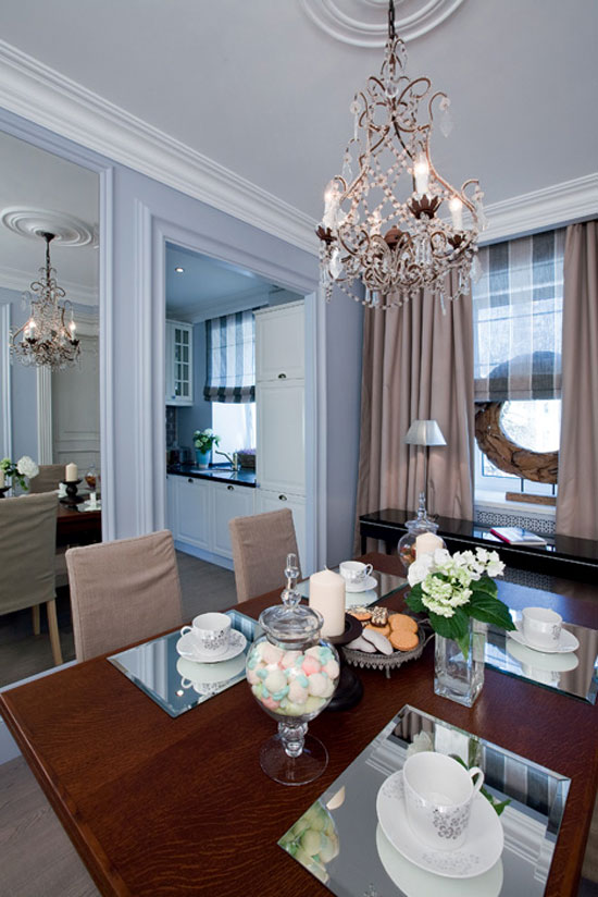 Two windows in the combined kitchen-dining room