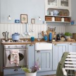 Blue Provence style kitchen with wooden top