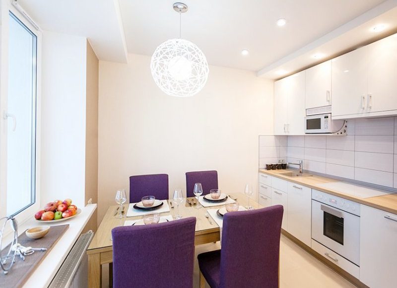 Interior of modern kitchen with wooden countertop