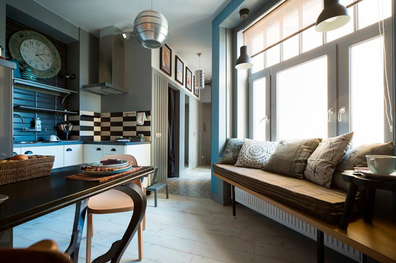 Kitchen with a sofa under the window