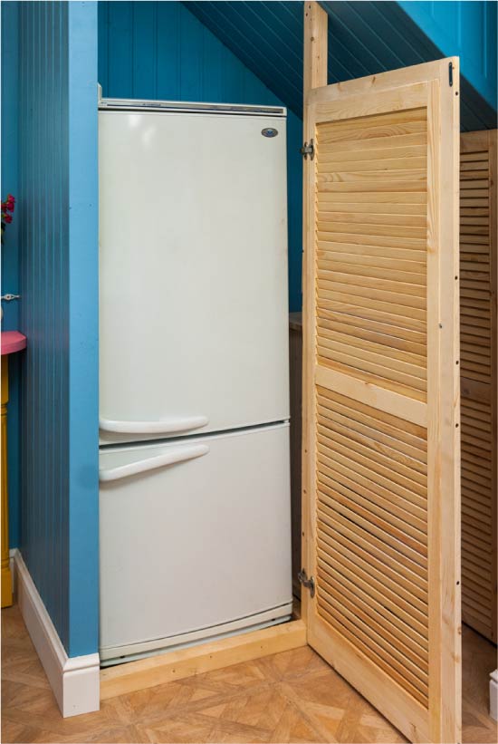 Refrigerator under the stairs