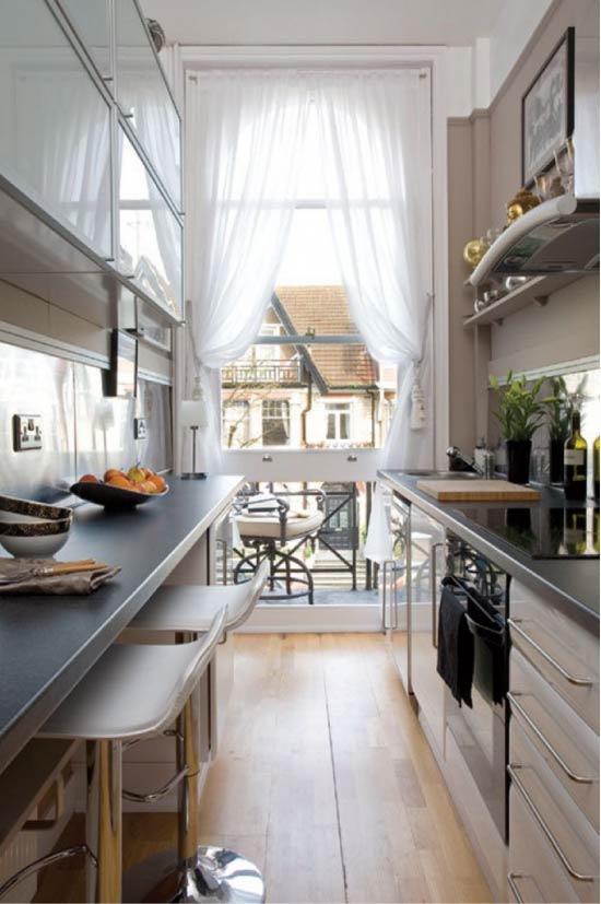 Bar counter along the wall in the two-row kitchen