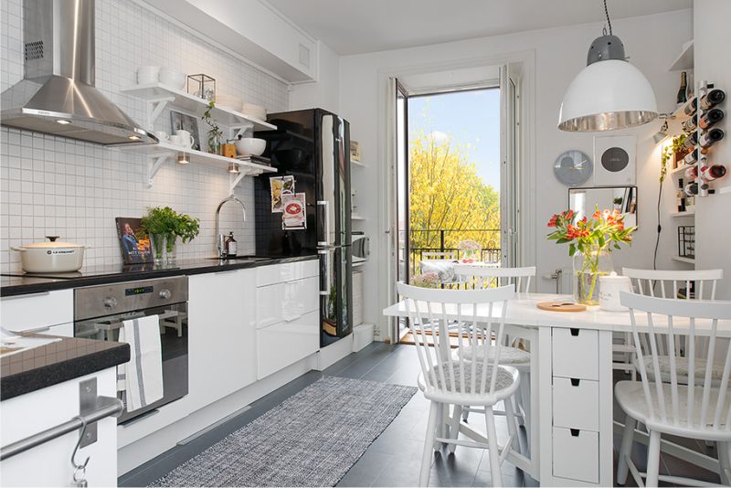 Kitchen with a balcony without curtains