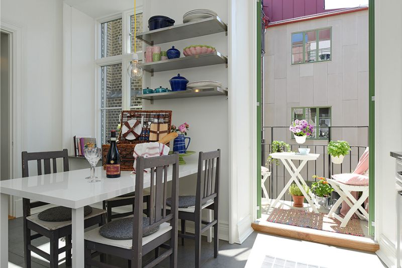 Kitchen with a balcony without curtains