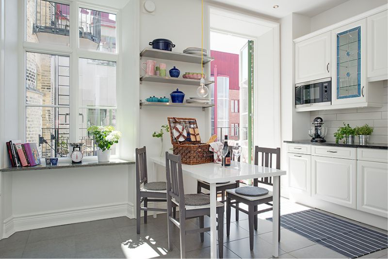 Kitchen with a balcony without curtains