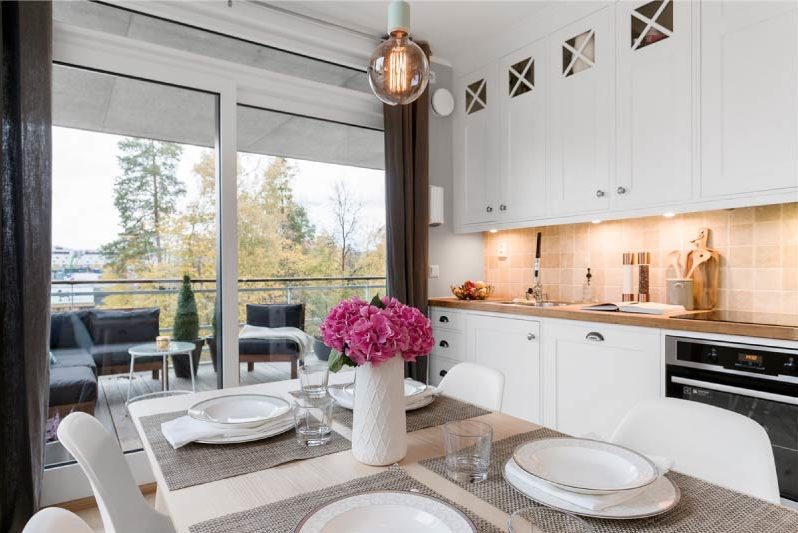 Modern kitchen interior with a balcony