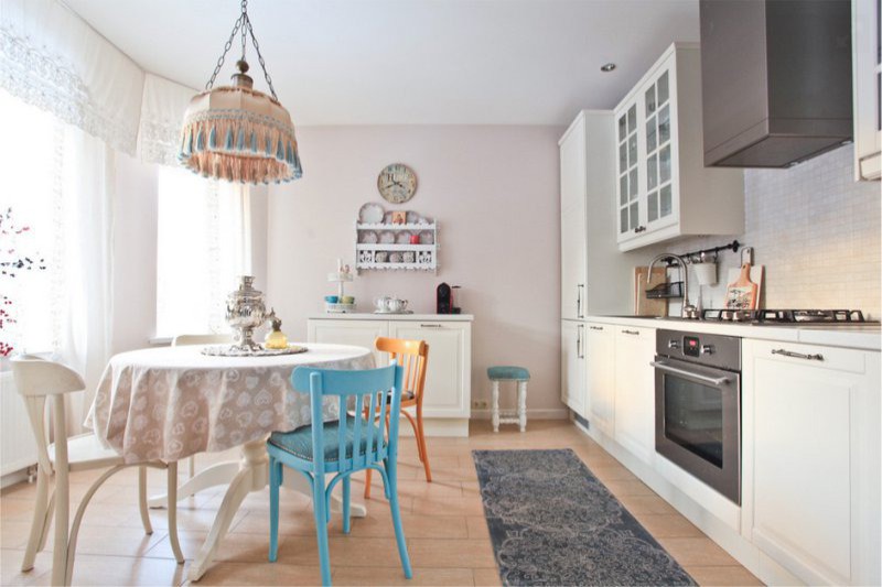 Country kitchen-dining room with shade above the table