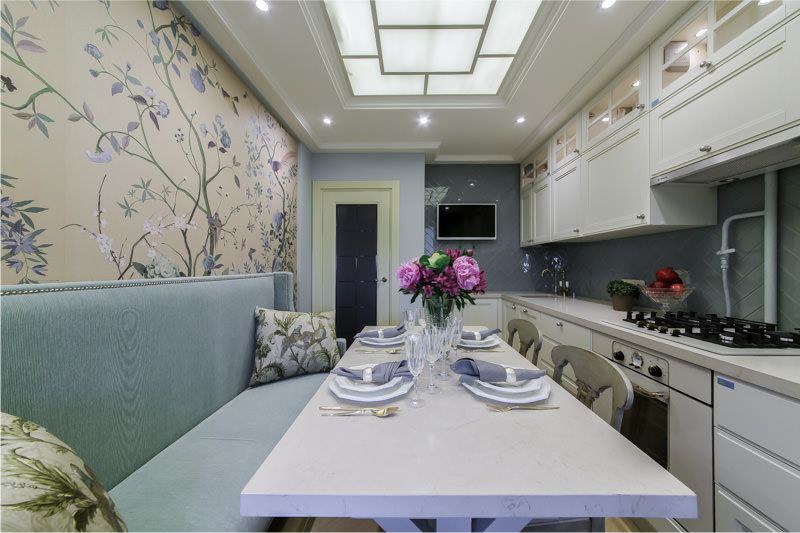 Small kitchen-dining room with a rectangular table.