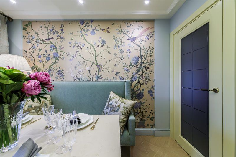 Small kitchen-dining room with a rectangular table.