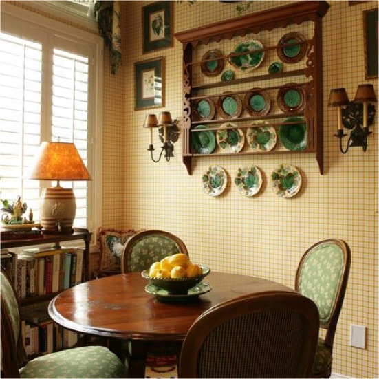 Wooden kitchen furniture with yellow wallpaper