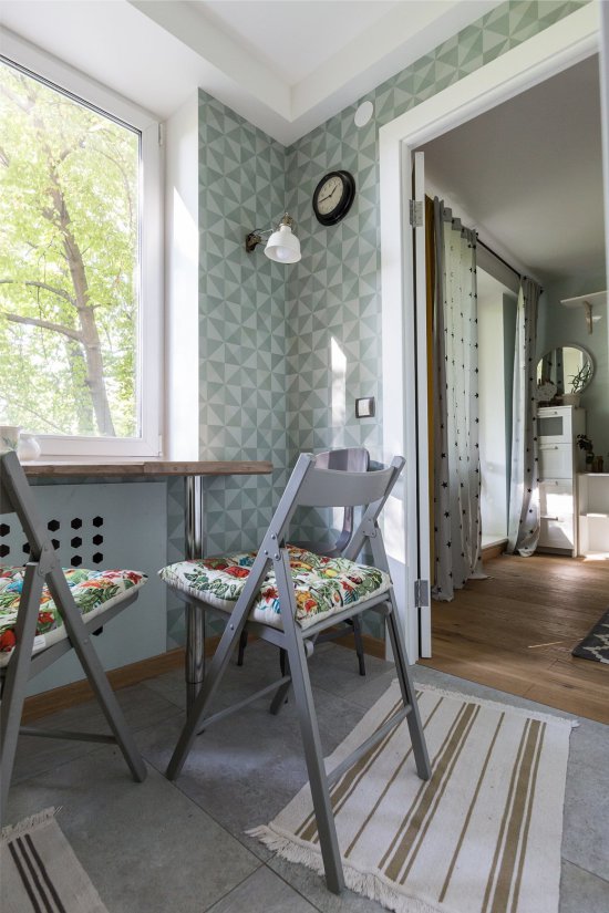 Kitchen with gray-blue wallpaper in Khrushchev