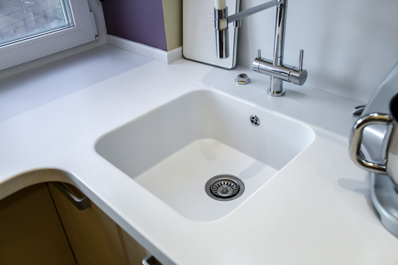 Countertop, sink and window sill of acrylic stone Corian