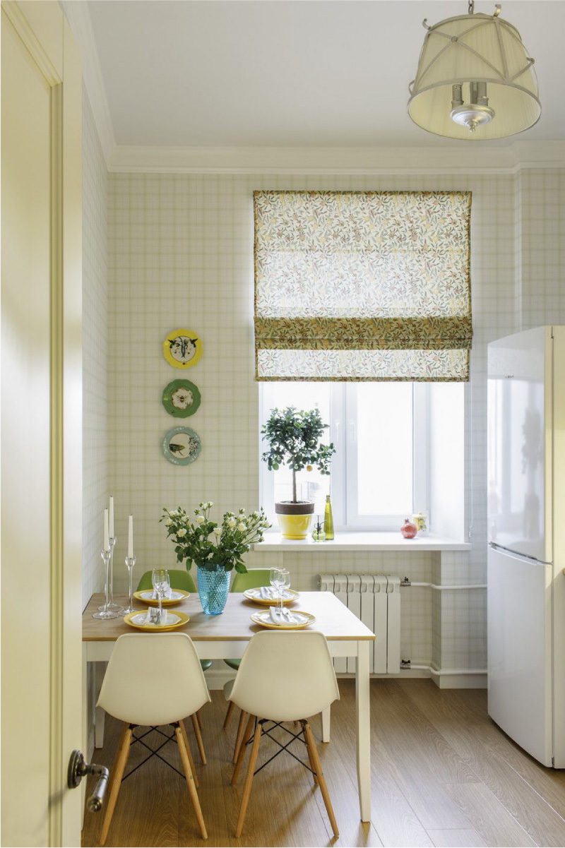 White kitchen with yellow wallpaper