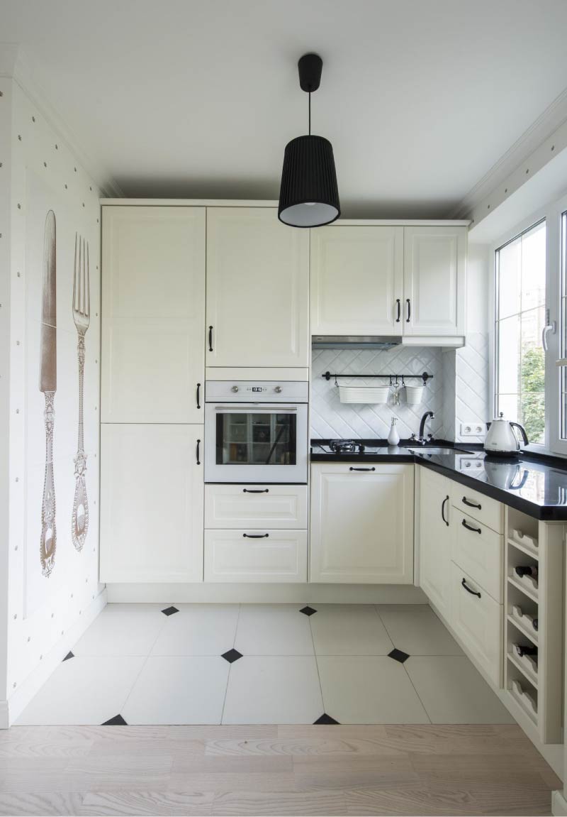 White kitchen with black worktop