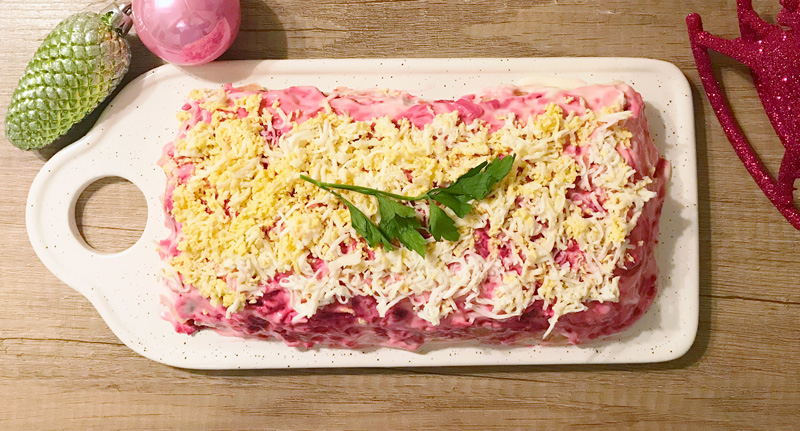 Herring under a fur coat on a dish