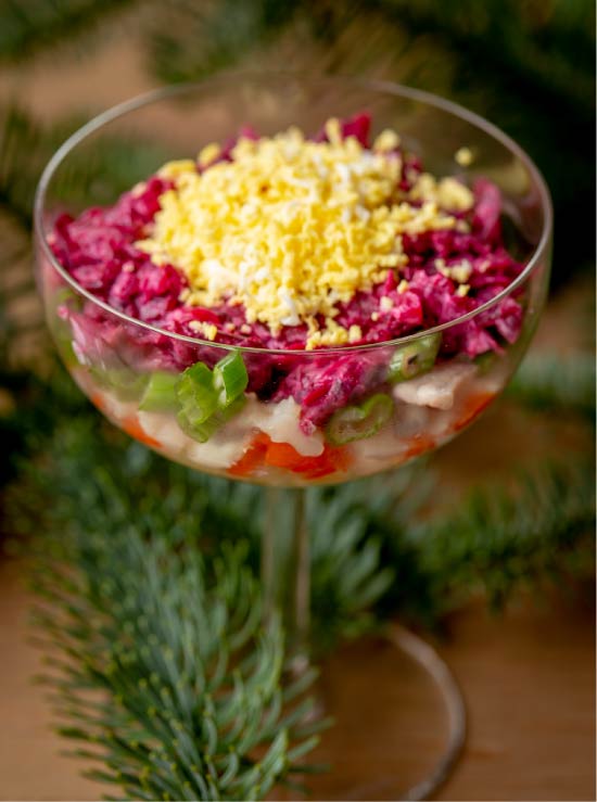 Herring under a fur coat in a glass