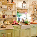 Green kitchen and beige wallpaper